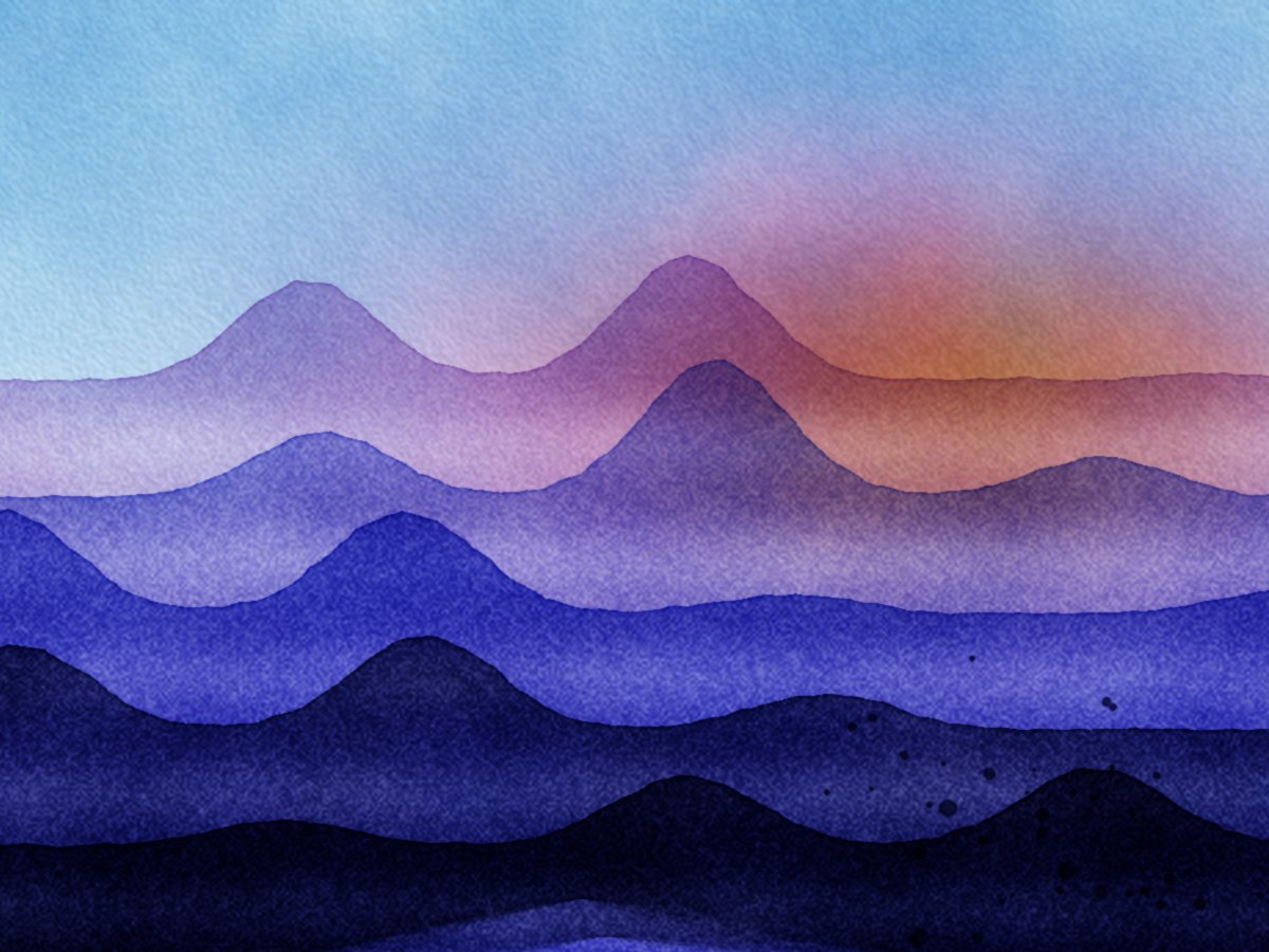 Layered mountain ranges at dusk